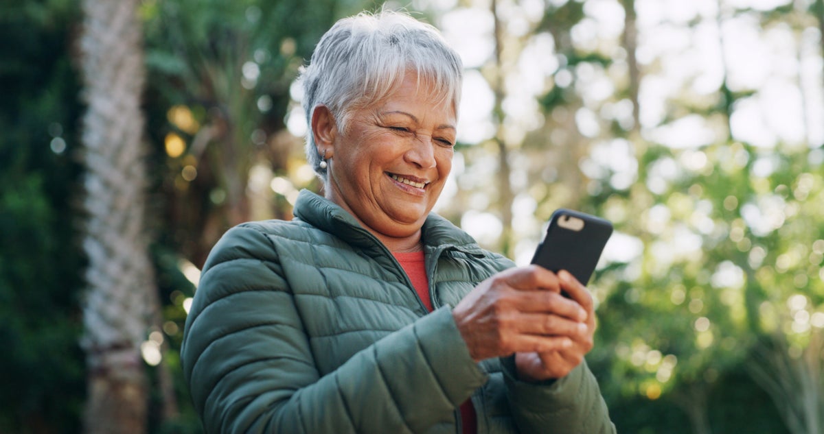 Person using Lark on a smartphone outdoors